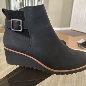 Black Wedge ankle boots with felt material around ankle and silver buckle detail